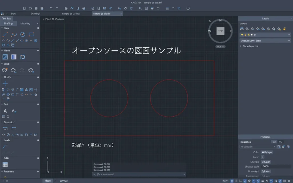 CADCraftでShift_JISのDXFを開いた画面。オープンソースの図面サンプル、部品A（単位：mm）という日本語の文字と、赤い長方形の外形線と円2つが表示されている